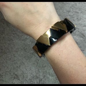 Tory Burch Black and Gold statement bangle